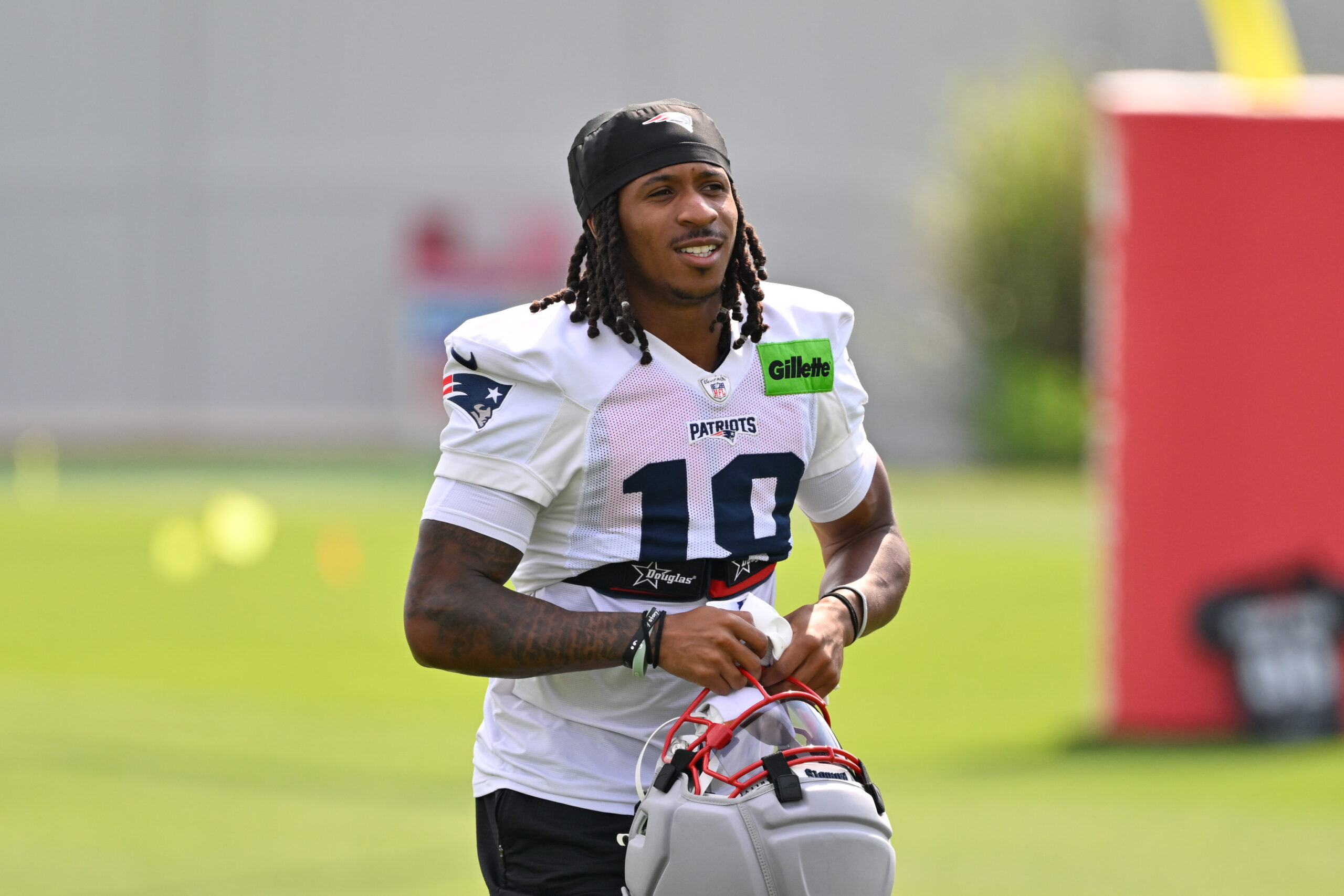 Jul 28, 2026; Foxborough, MA, USA; New England Patriots wide receiver Kyle Williams (18) walks to practice for training camp at Gillette Stadium. Mandatory Credit: Eric Canha-Imagn Images