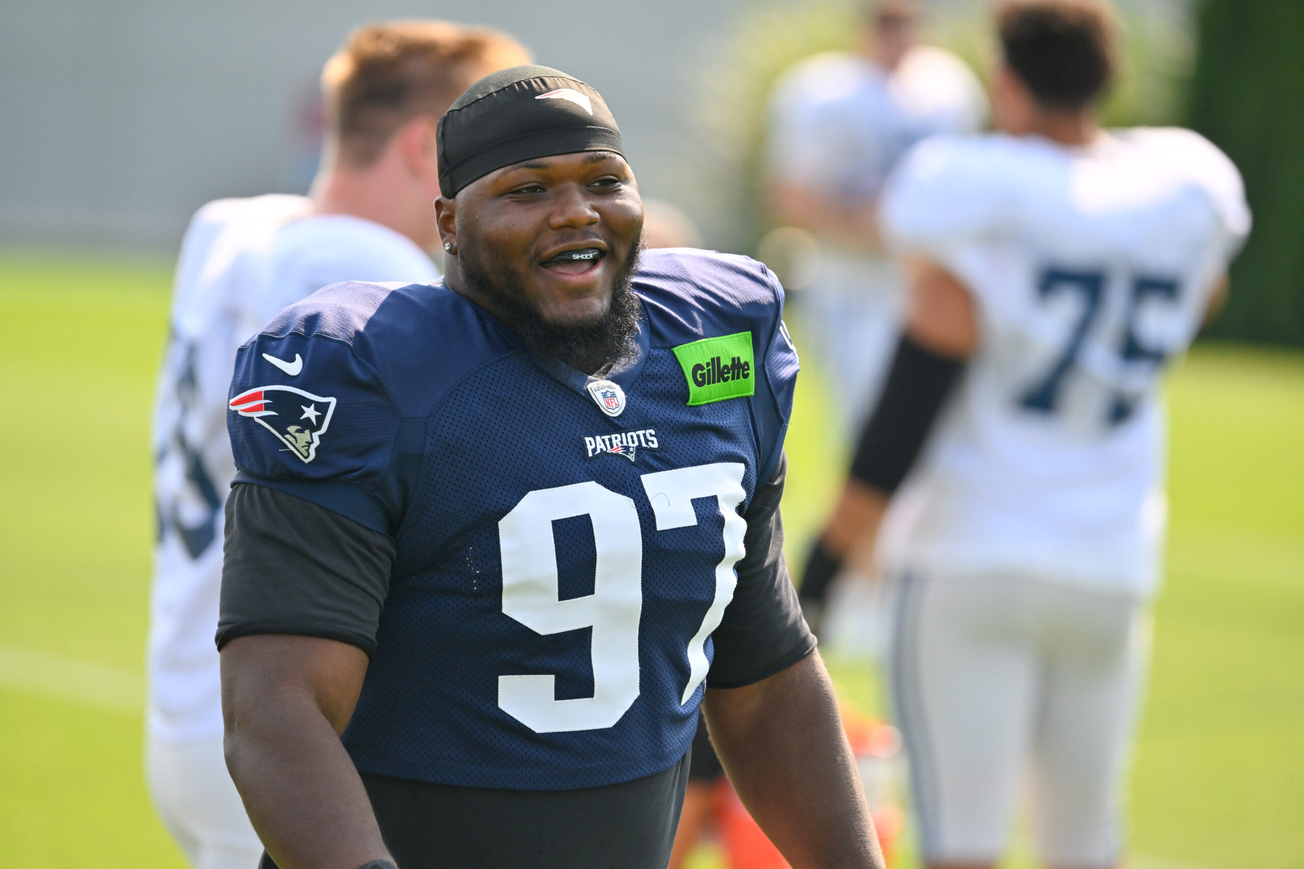 Aug 11, 2026; Foxborough, MA, USA; New England Patriots defensive tackle Milton Williams (97) walks to the practice fields during training camp at Gillette Stadium. Mandatory Credit: Eric Canha-Imagn Images