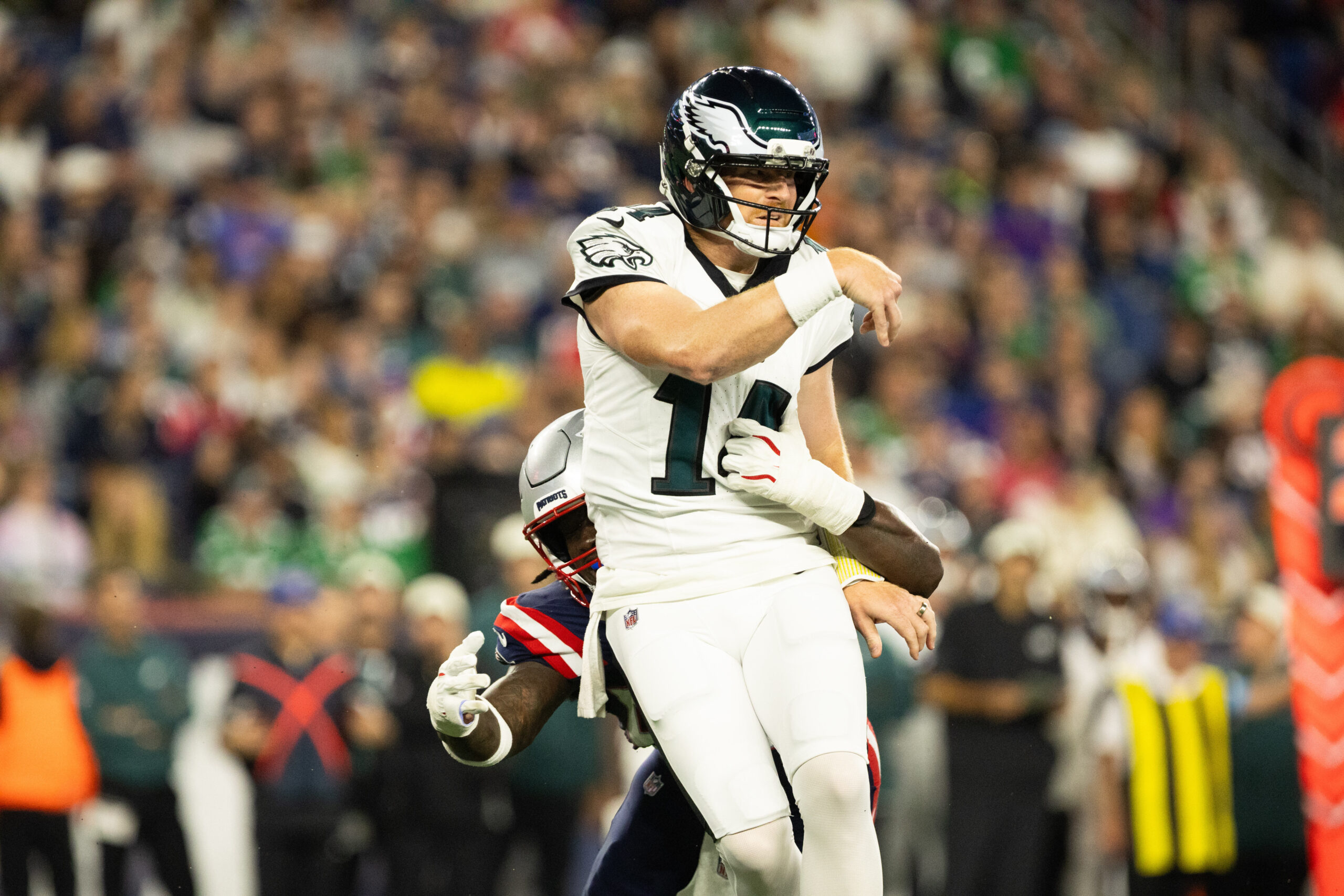 Aug 22, 2026; Foxborough, Massachusetts, USA; New England Patriots linebacker Gabe Jacas (50) tackles Philadelphia Eagles quarterback Andy Dalton (14) in the first half at Gillette Stadium. Mandatory Credit: Edward Finan-Imagn Images